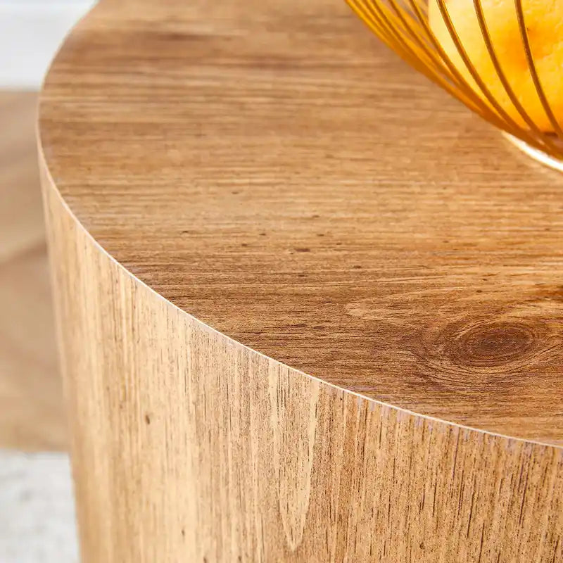 Tavolino da caffè rotondo moderno con base cilindrica decorata