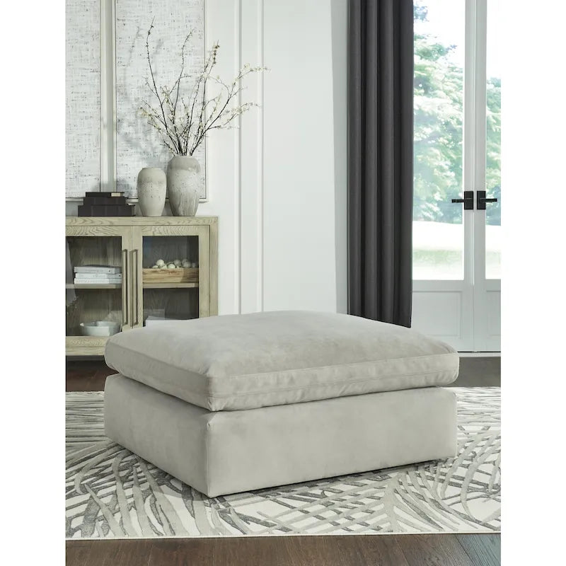 Pouf decorativo oversize in similpelle scamosciata con imbottitura in piuma e schiuma