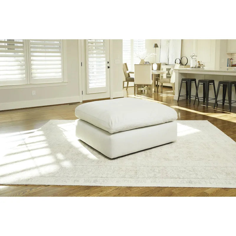 Pouf decorativo oversize in similpelle scamosciata con imbottitura in piuma e schiuma